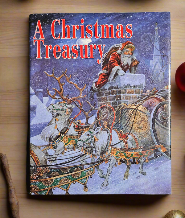 Book titled 'A Christmas Treasury' with a festive cover featuring Santa Claus and reindeer on a wooden surface with Christmas decorations.